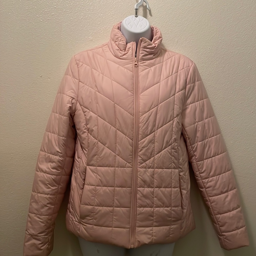 Pink light puffer jacket.